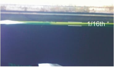 This graphic shows the approximate 1/16-inch off contact gap between the print side of the screen
        and the garment surface. 