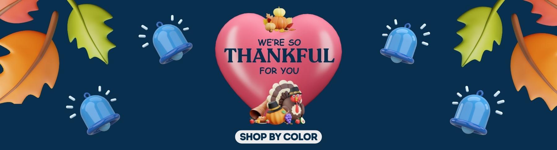 Banner for 3D heart on the middle with 3d bells, turkey, pumpkin, and leaves on blue background with text We're so Thankful for You