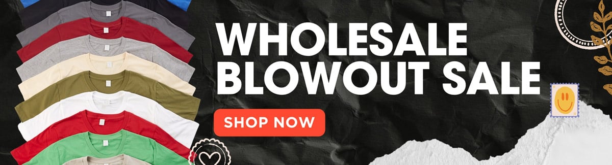 Banner for Overlapping shirts in different colors on a crumpled black background with text Wholesale Blowout Sale