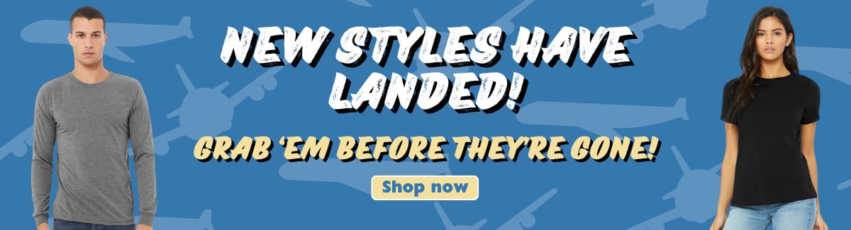 Banner for A man on grey long-sleeve shirt and a woman on black shirt on a blue background with text New Styles Have Landed - Grab em Before They are Gone
